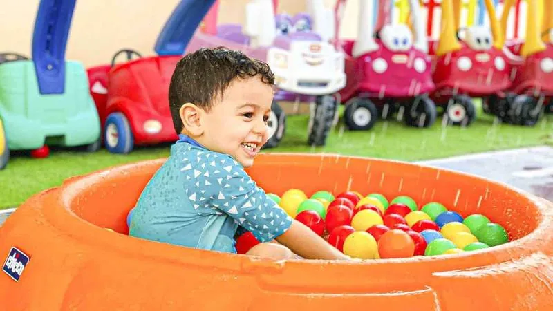 A child in the ball pit