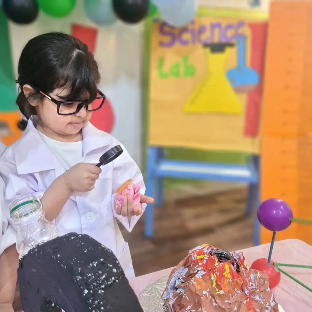 Children exploring at the sensory table